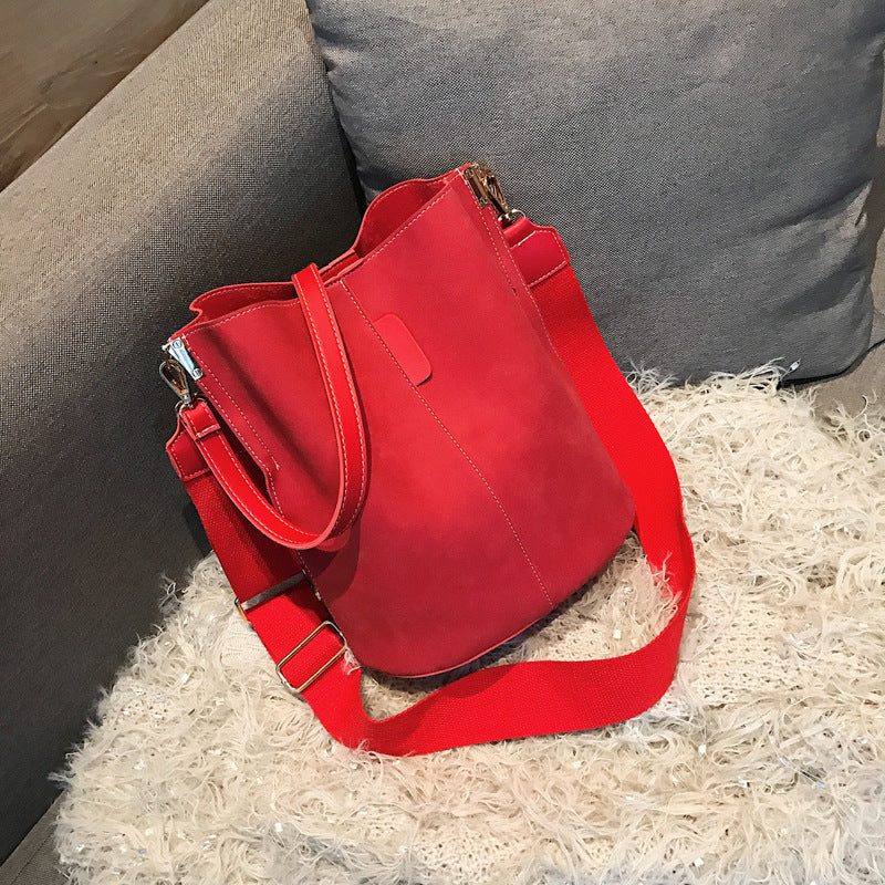 Sac fourre tout bandoulière type seau pour femme