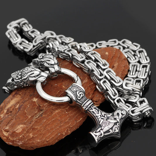 Collier orné de têtes loup et son pendentif marteau de Thor