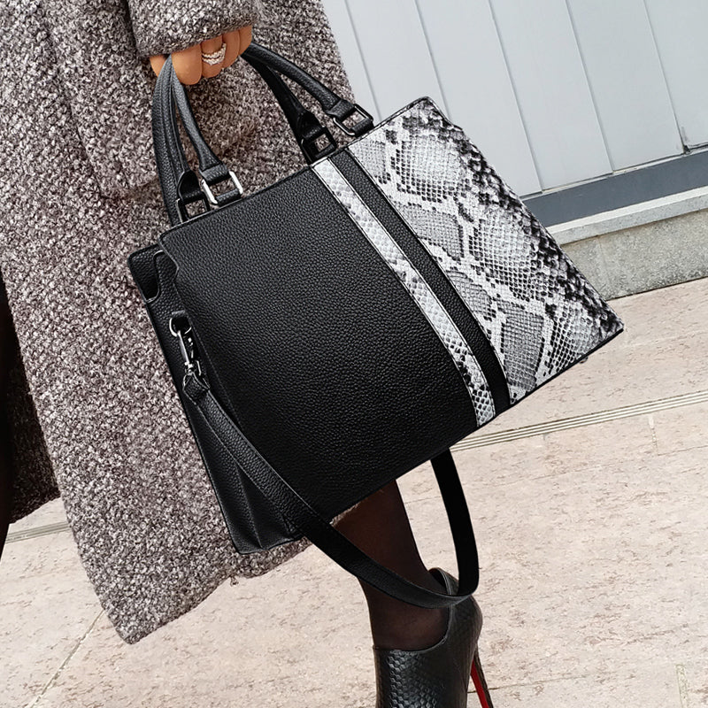 Sac à main noir et motif python pour femme