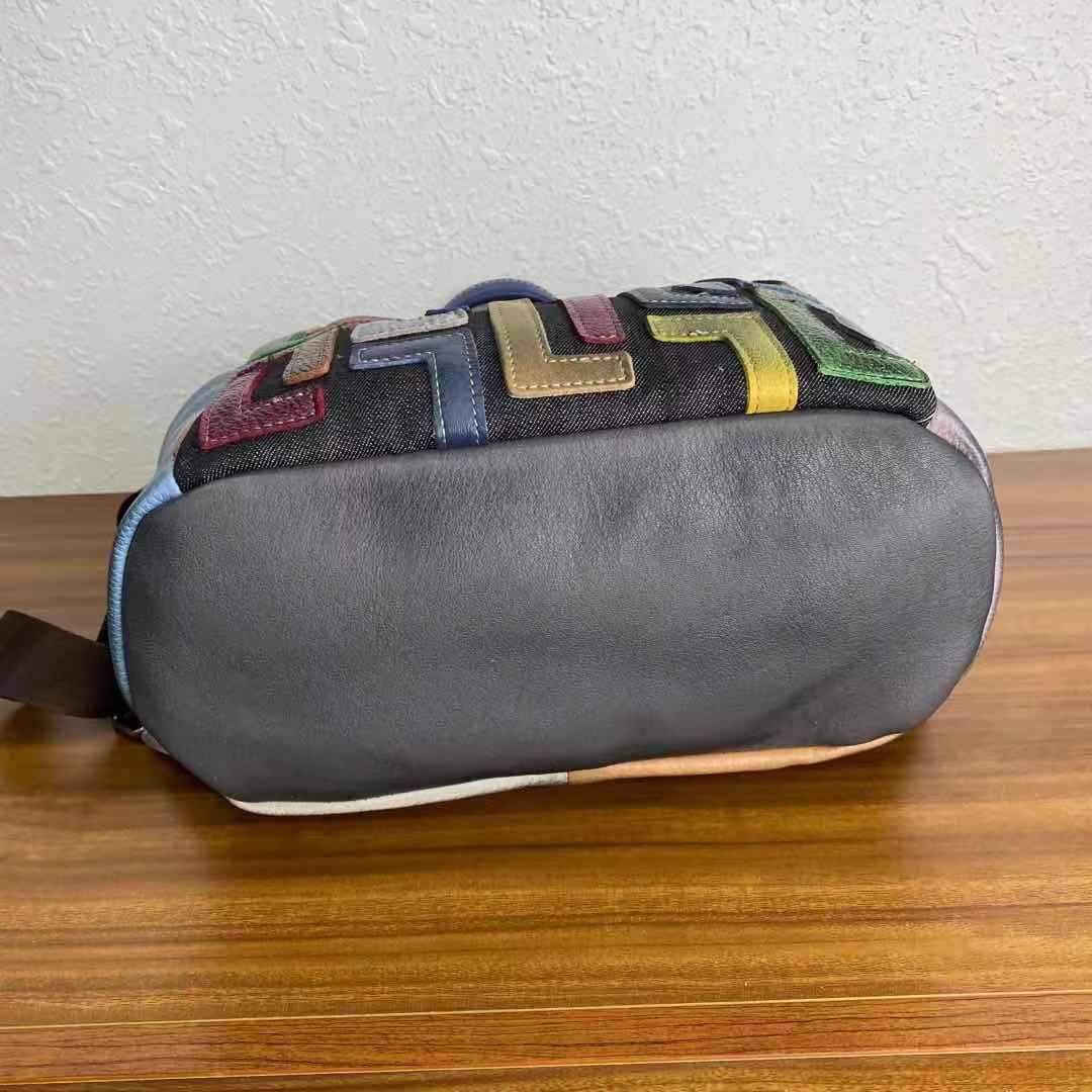 Sac à dos en cuir multicolor de grande capacité et polyvalent