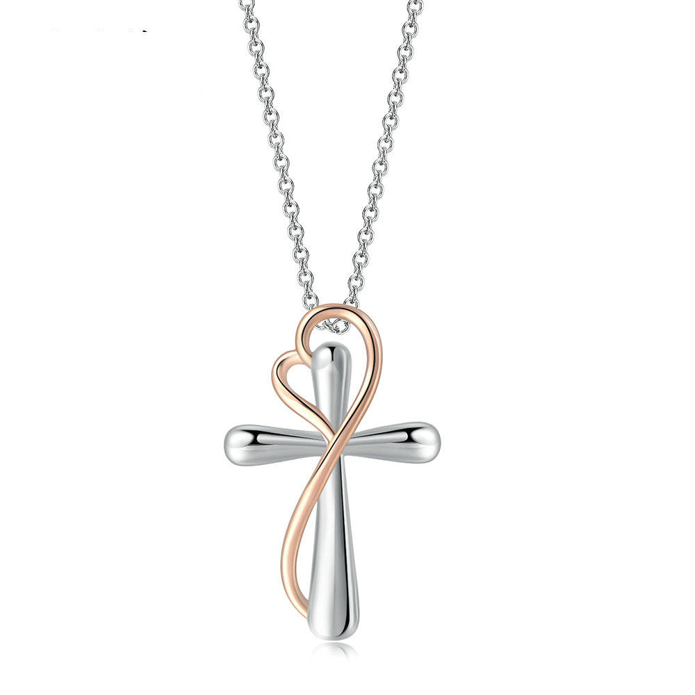 Collier croix enlacé d'un coeur