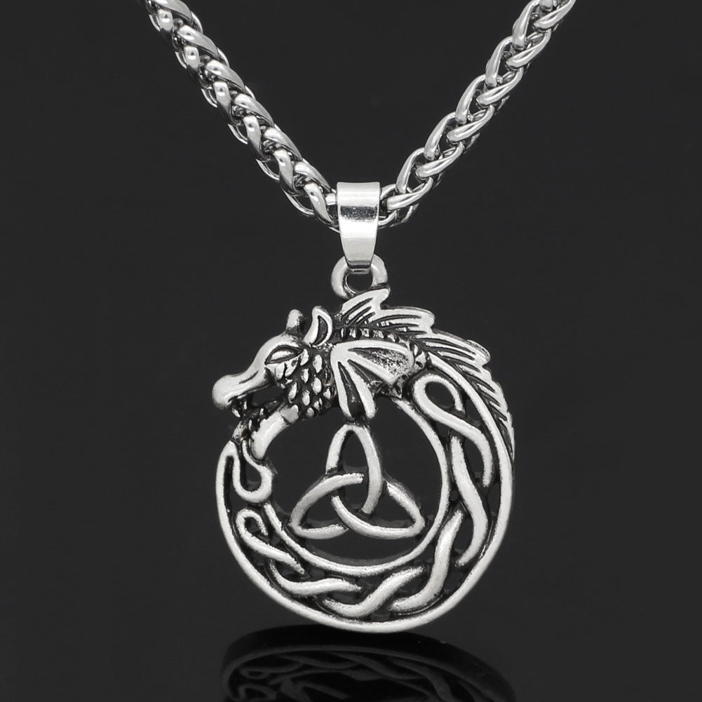 Collier dragon encerclant le noeud celtique de la trinité