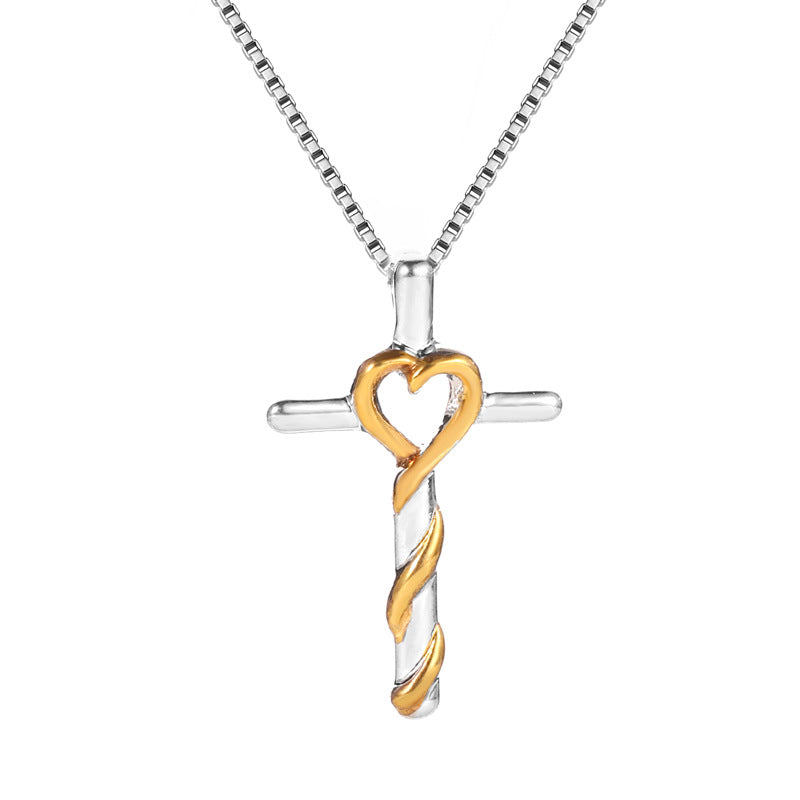 Collier avec pendentif en croix avec coeur