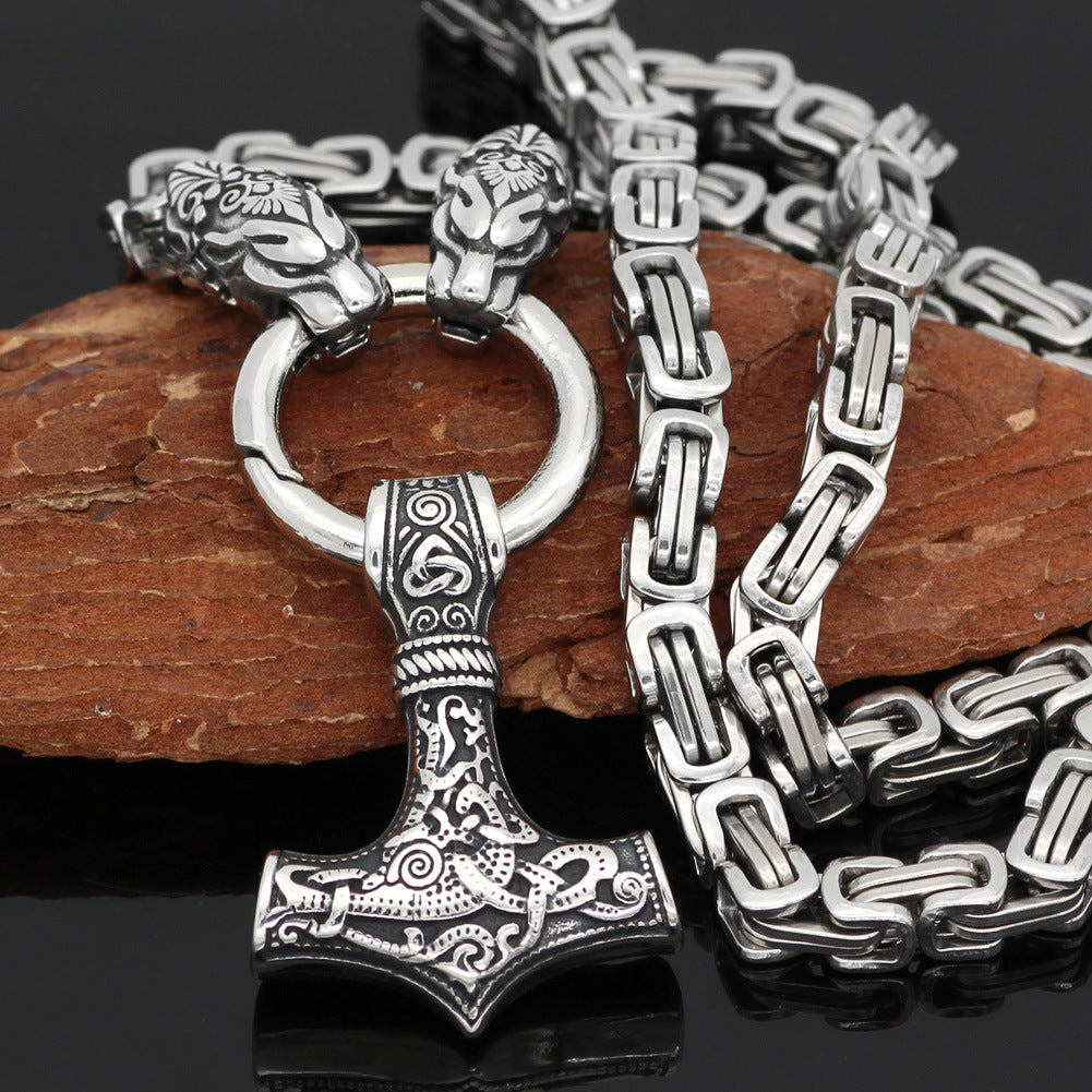 Collier orné de têtes loup et son pendentif marteau de Thor